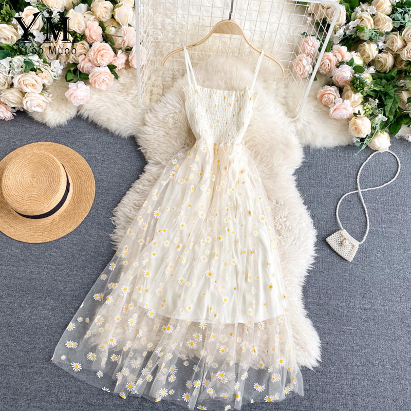 Vestido midi de malla con estampado floral de margaritas